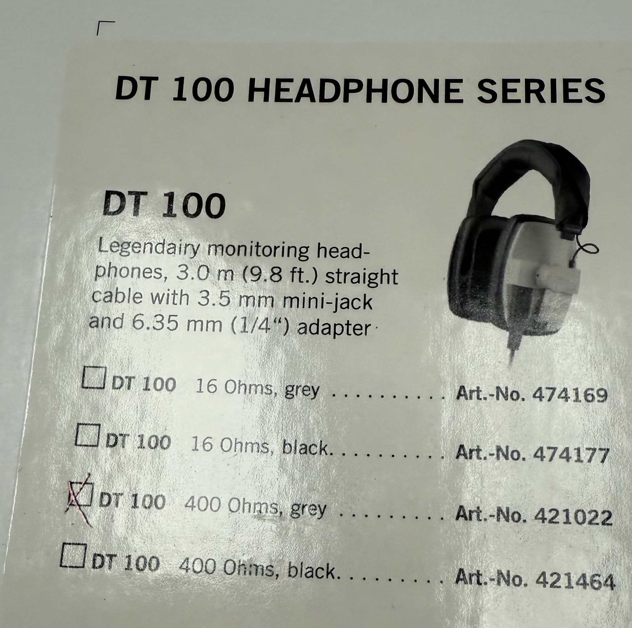 Close-up detail of grey Beyerdynamic DT 100 professional studio headphones
