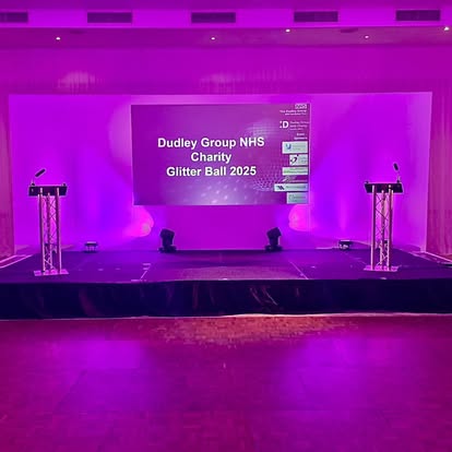 Conference stage with twin lecterns and large display
