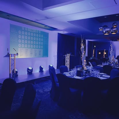 Conference dinner room with stage lighting