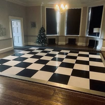 Black and white chequer dance floor in a reception room
