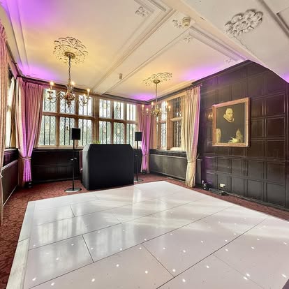 White starlight dance floor with DJ setup