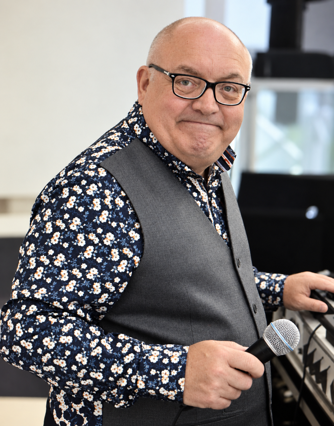 Award-winning DJ Paul James with microphone