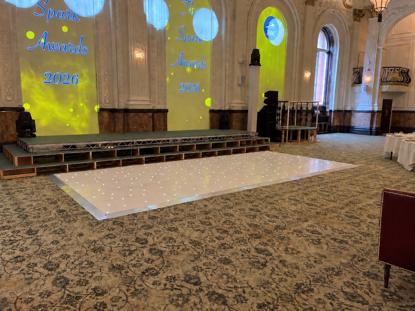 White starlight dance floor installed in front of the stage ready for the Awards 2026