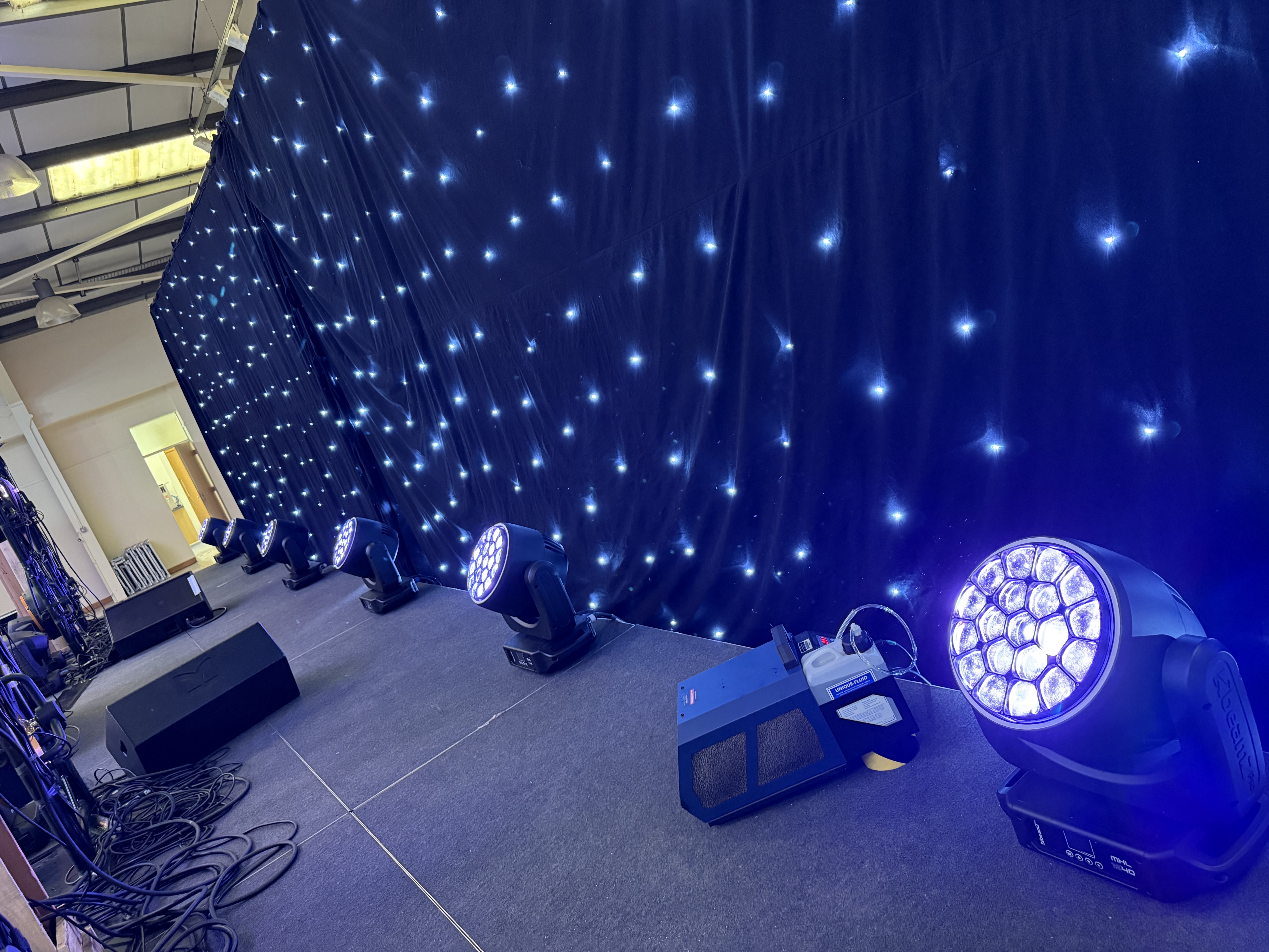 Busfest starlight backdrop, stage lighting and haze setup at Malvern Showground