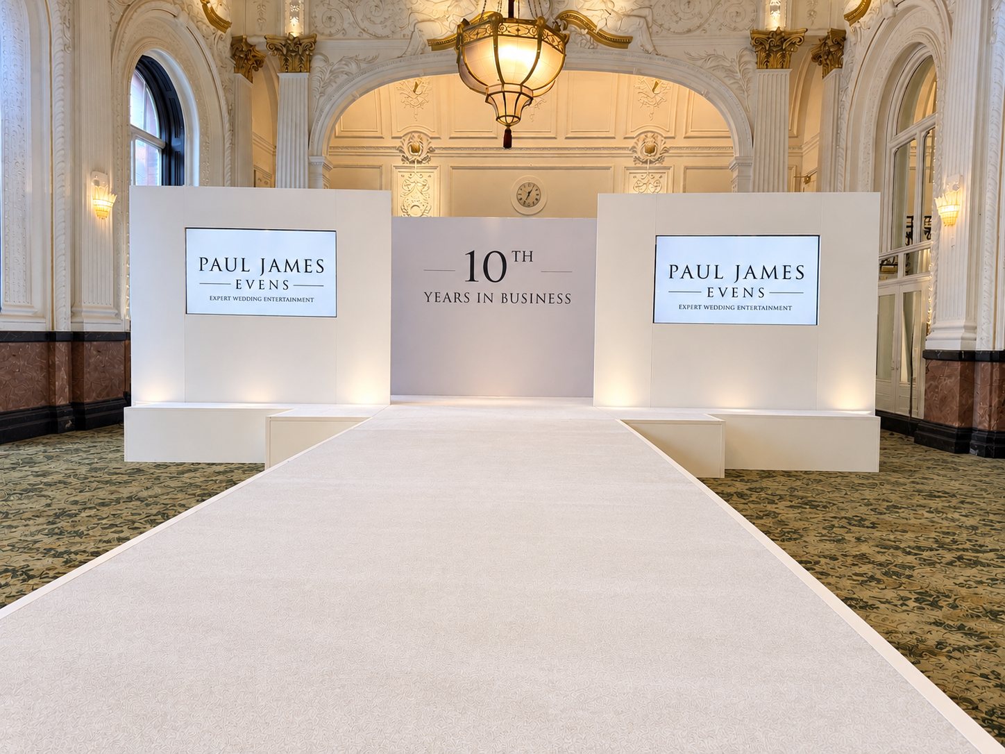 Two white side flats with large screens supplied for a fashion show on 1st September 2026