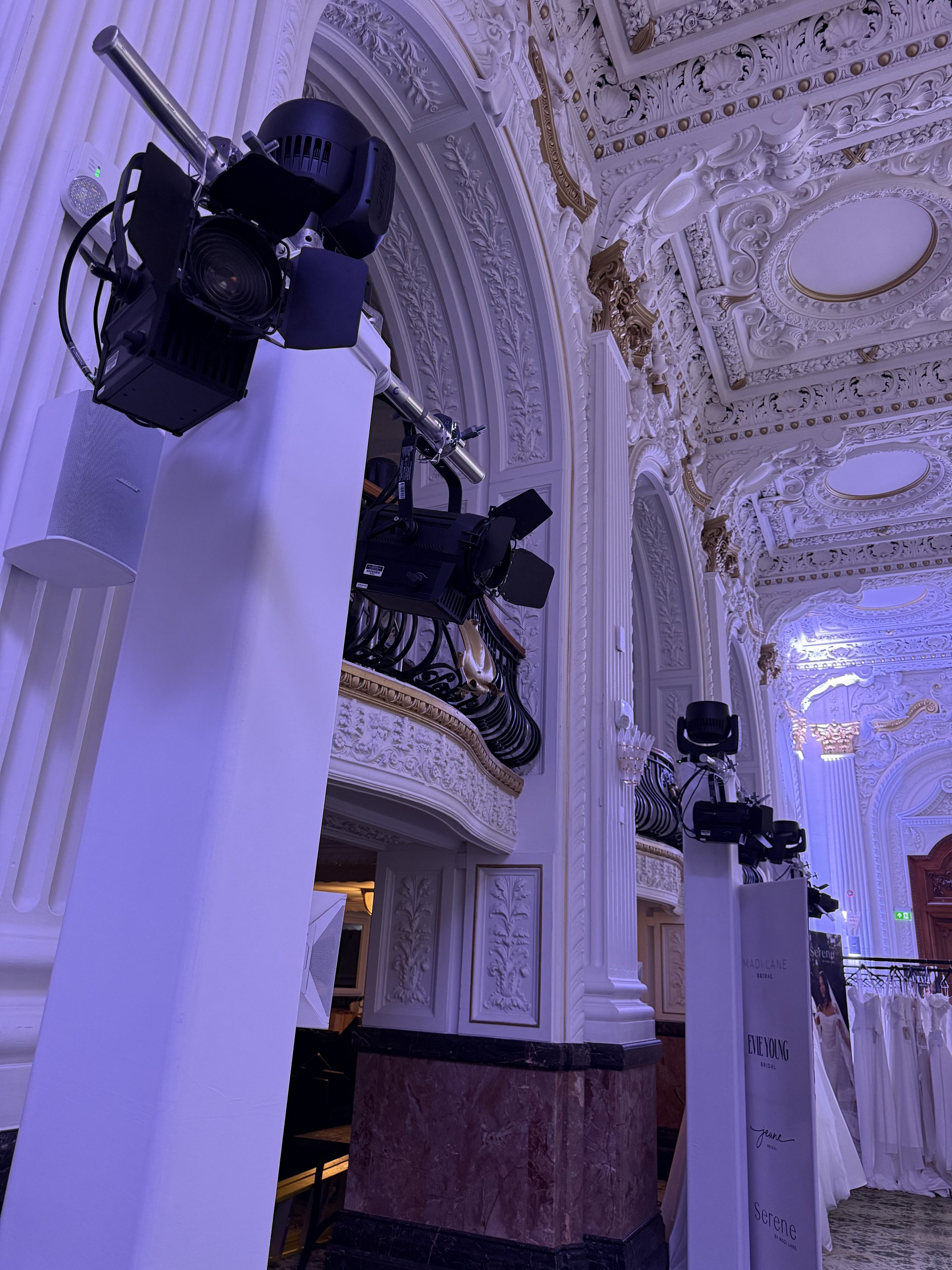 White truss support towers with moving heads and spot lighting supplied for a fashion show catwalk on 1st September 2026