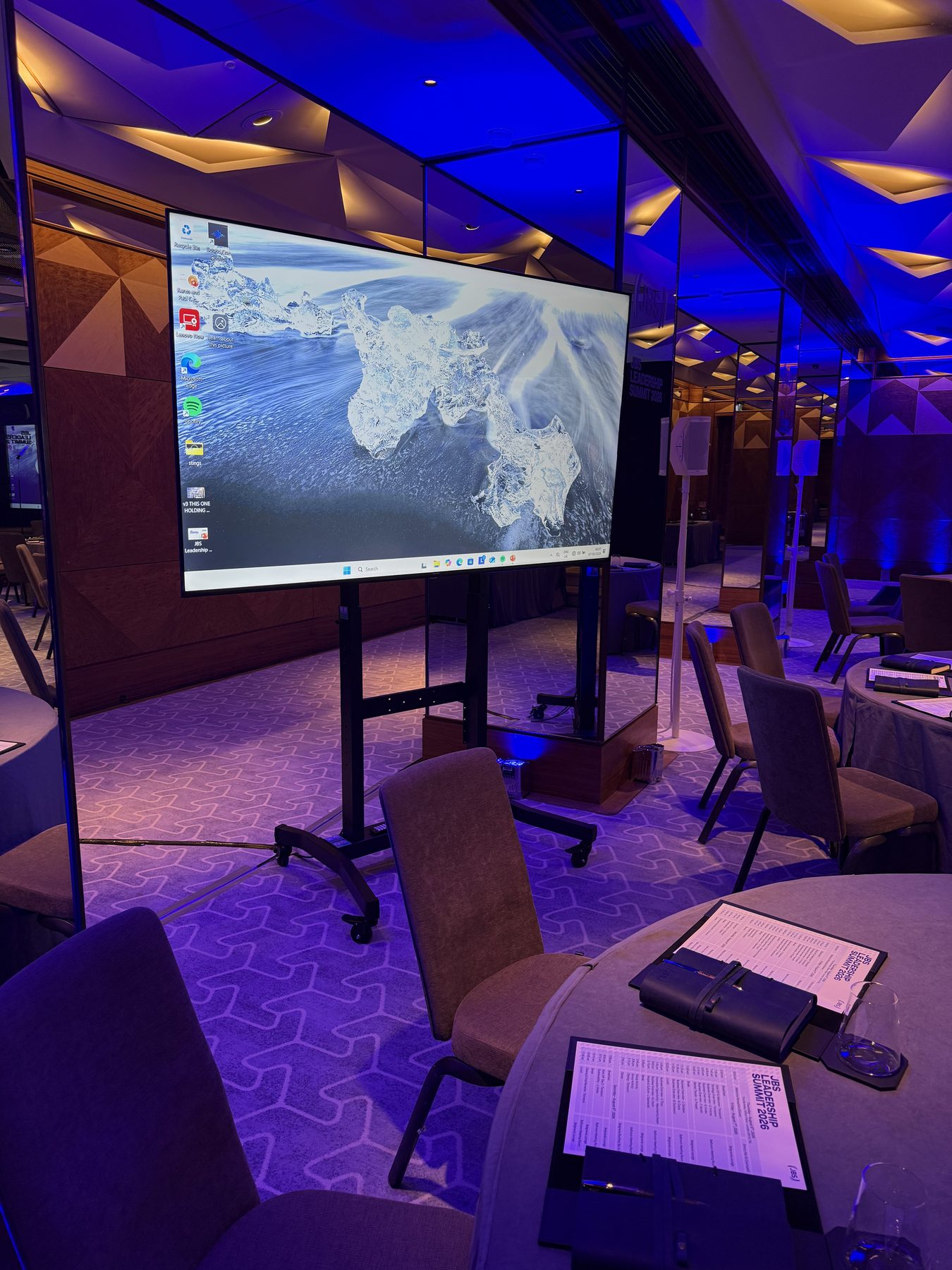 Angled view of large presentation screen for conference hire in London