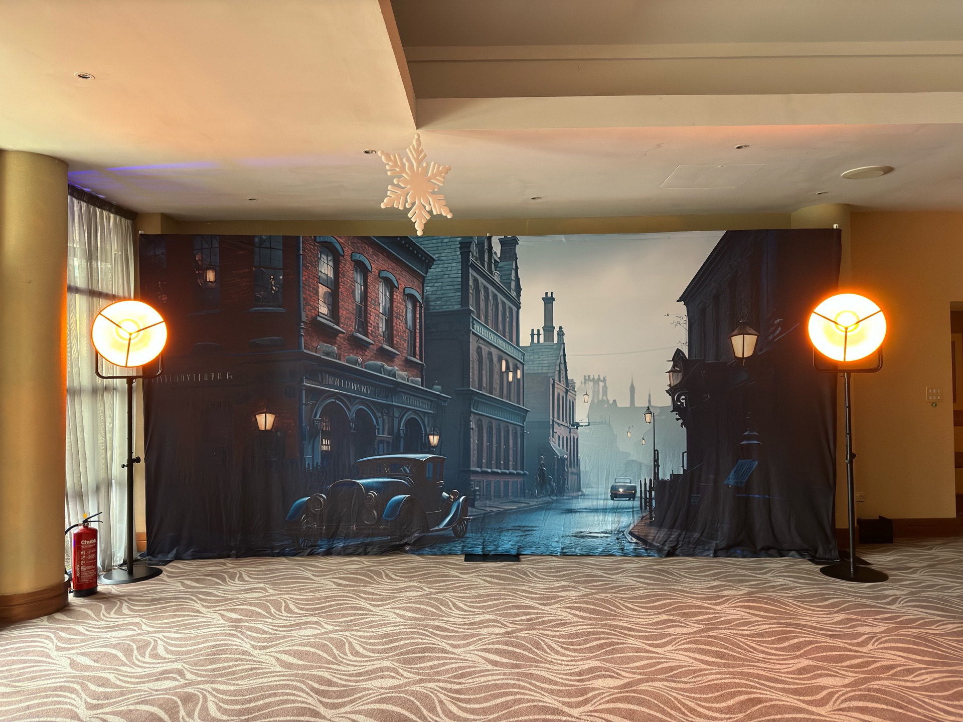 Vintage Peaky Blinders street scene backdrop for retro themed event hire