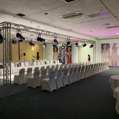 Fashion catwalk seating with overhead truss lighting