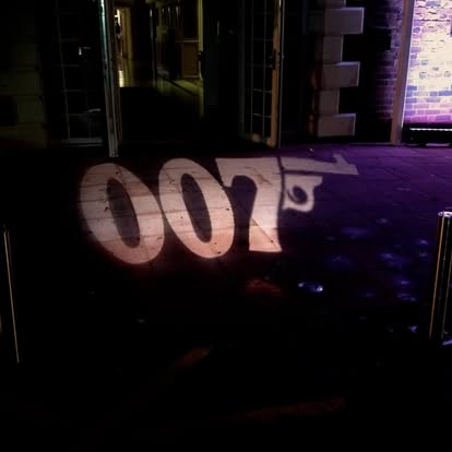 007 themed gobo projection on an outdoor surface