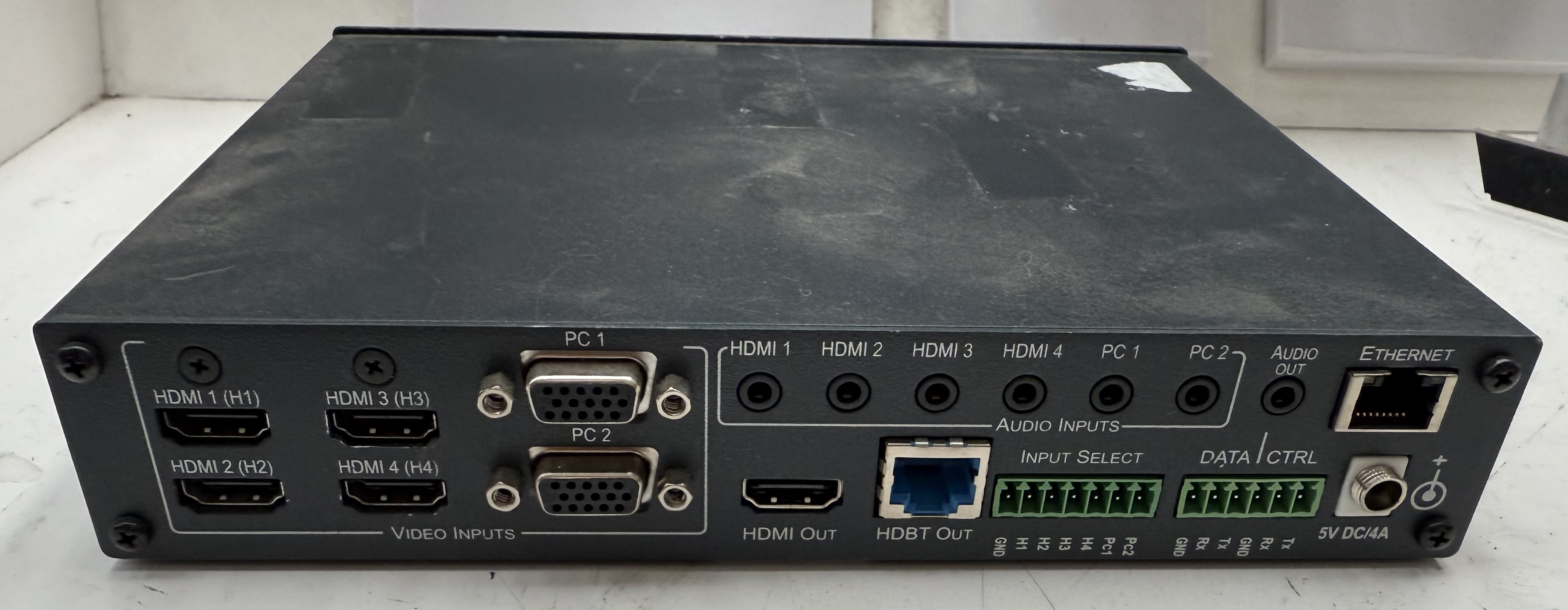 Rear connections of the Kramer VP-440 showing four HDMI inputs, two VGA inputs, HDMI output and HDBaseT output