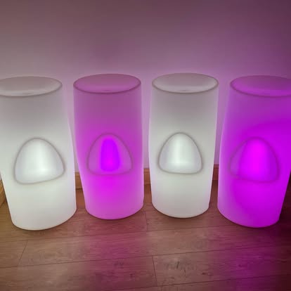 LED bar tables lit in pink and white