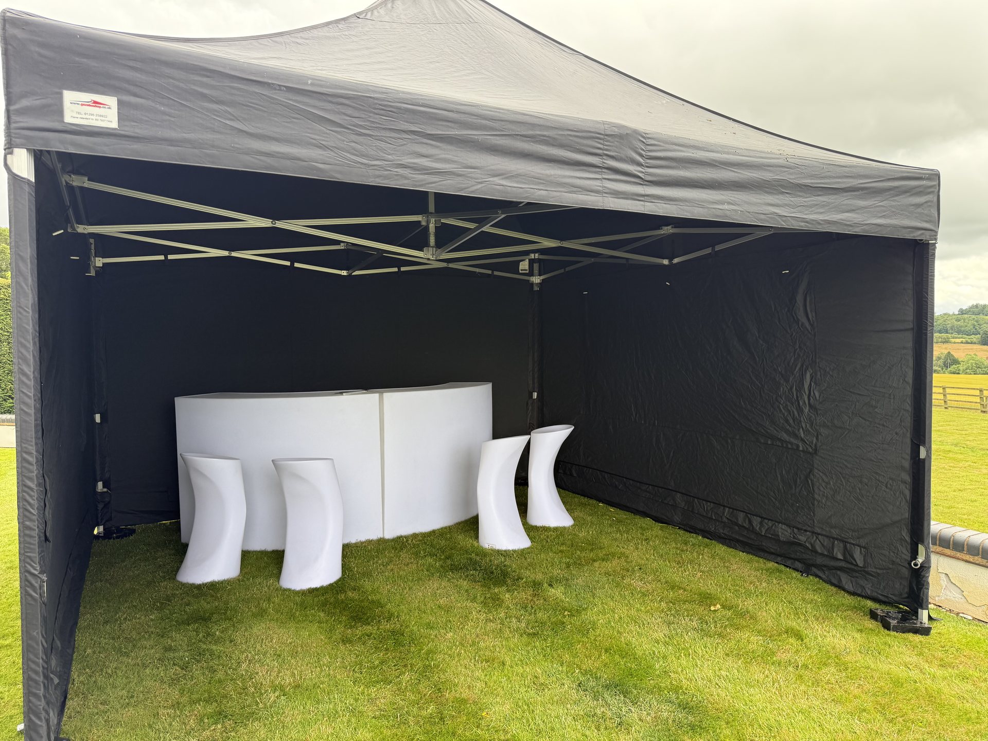 LED furniture inside a black marquee