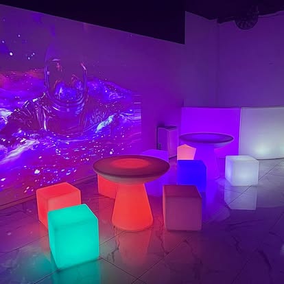 LED furniture setup with coloured tables and cubes