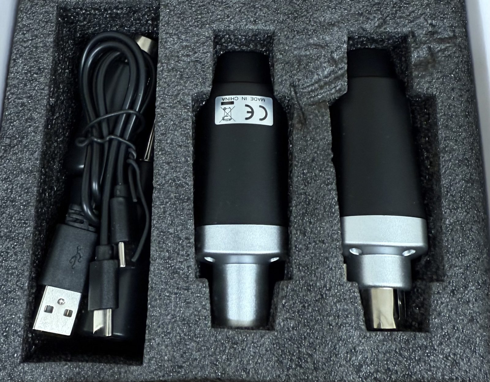 M-04 wireless XLR transmitter, receiver and USB charging cable in the fitted box