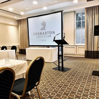 Lectern and screen setup in a meeting room