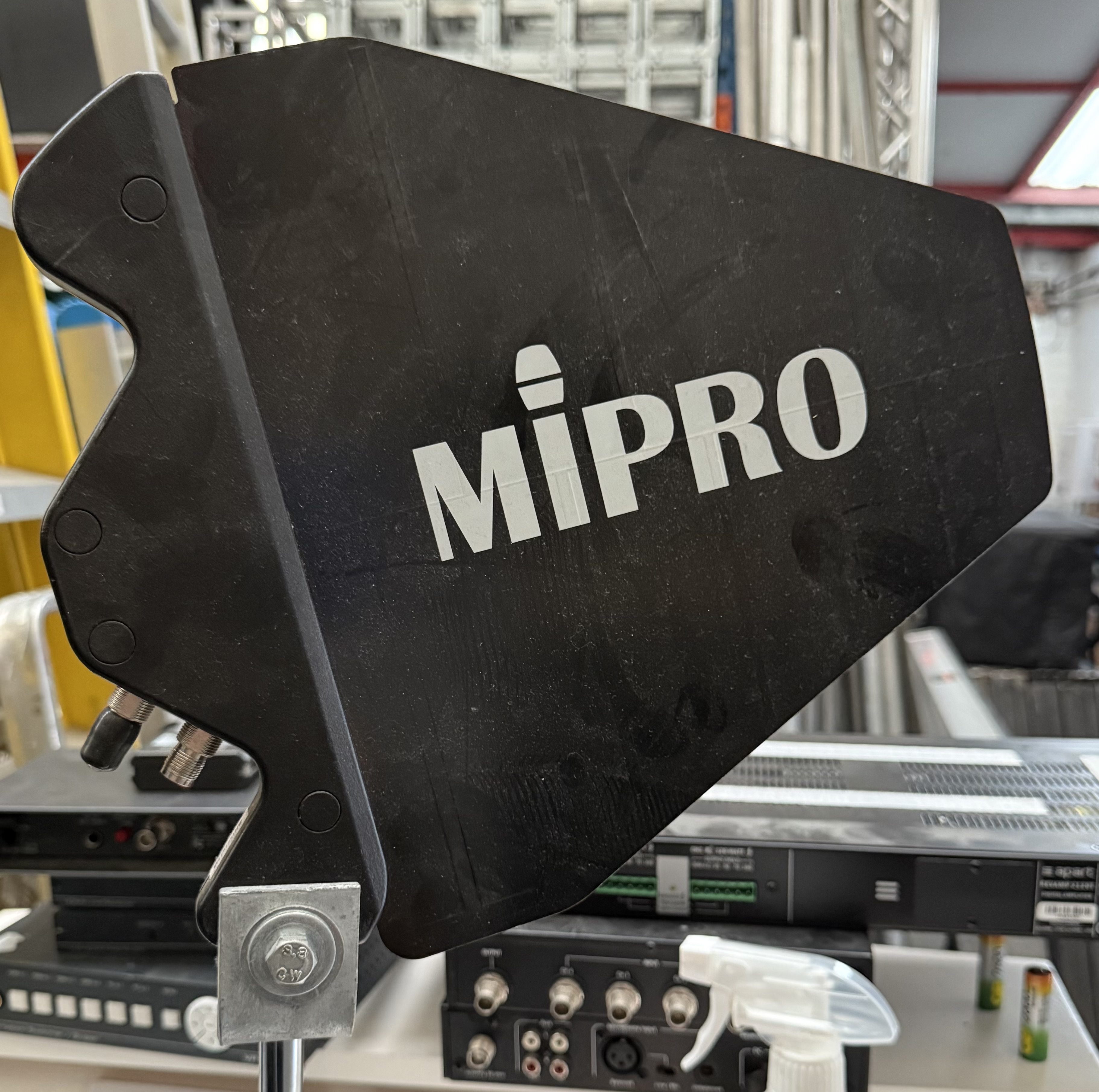 Used MIPRO AT-90W wideband directional antenna mounted on its heavy desktop stand