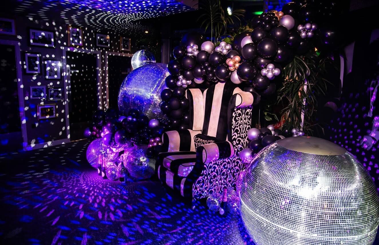 Mirror ball event styling with lighting effects
