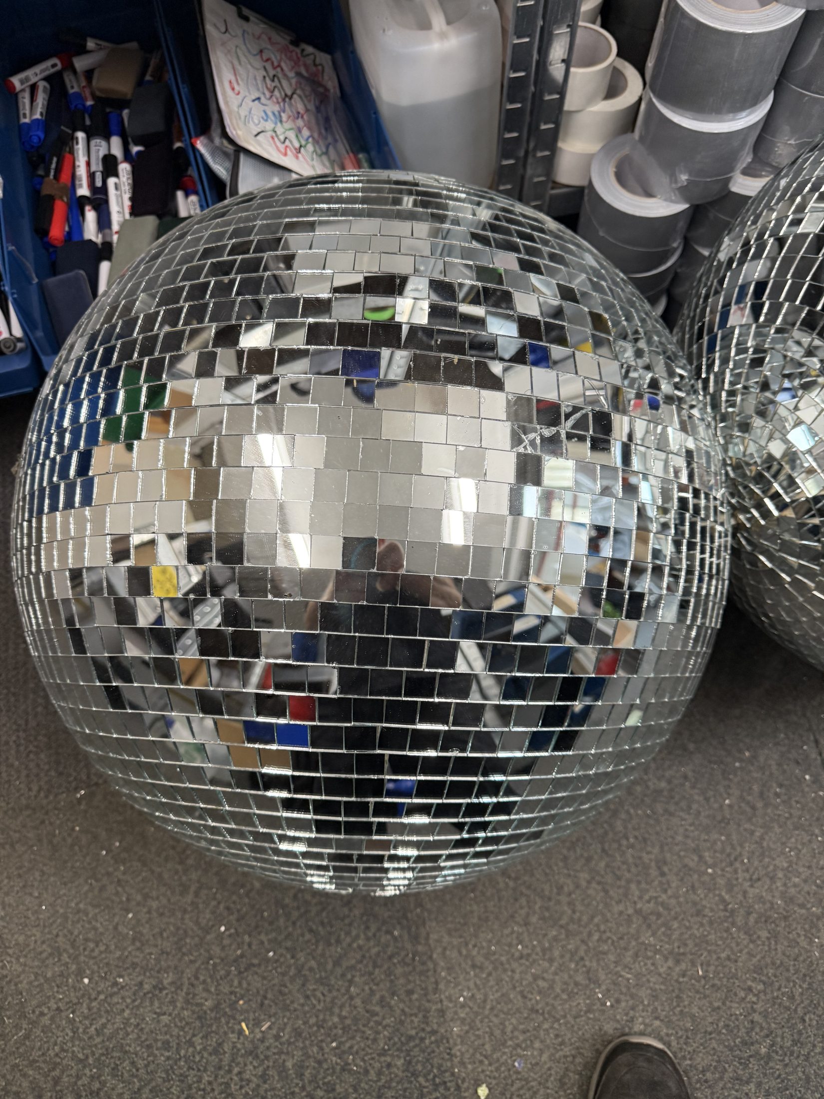 Single 60cm silver mirror ball showing the mirrored tile finish