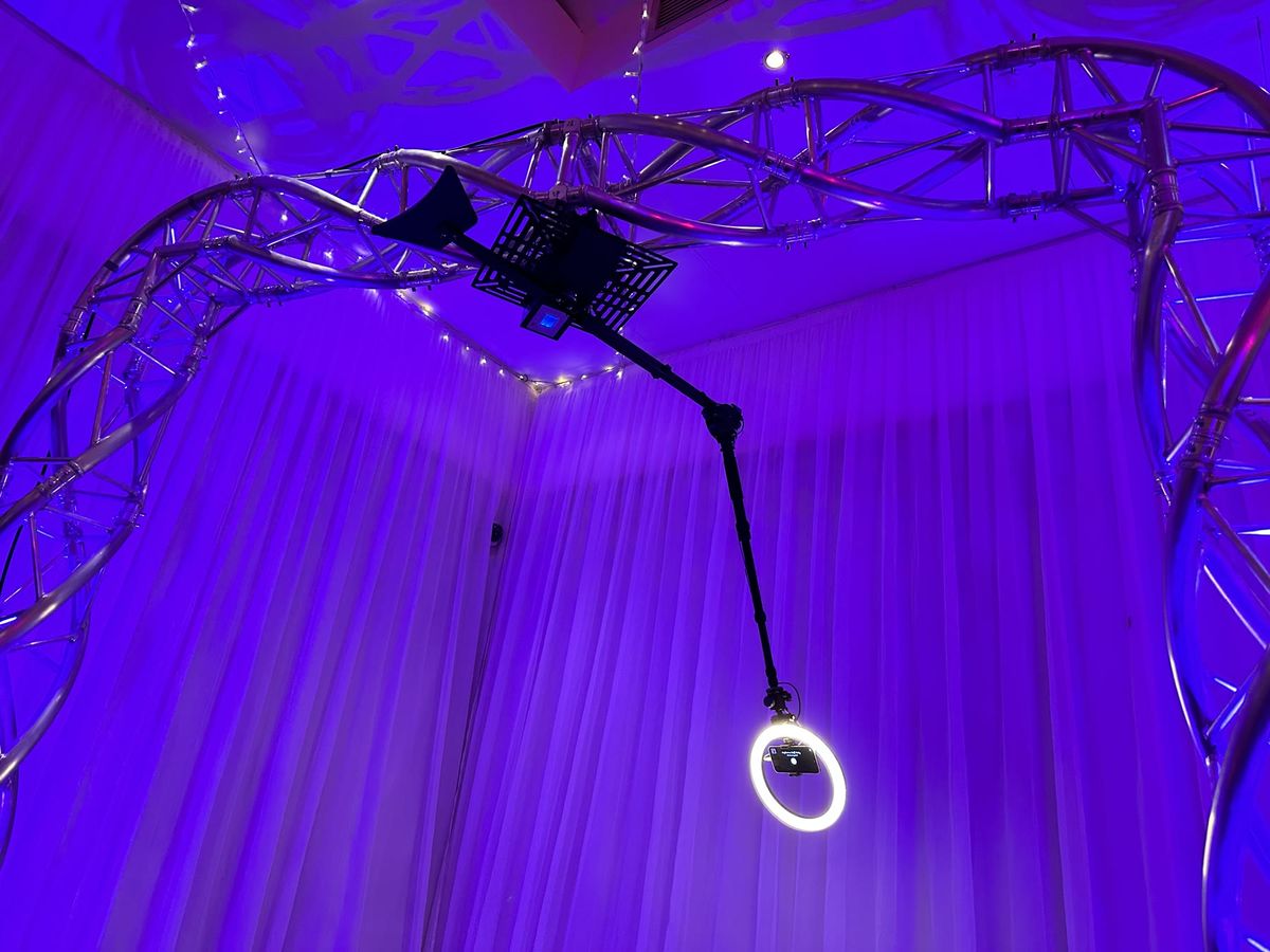 Purple-lit 360 video booth camera rig and truss arch