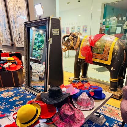 Mirror photo booth with themed props
