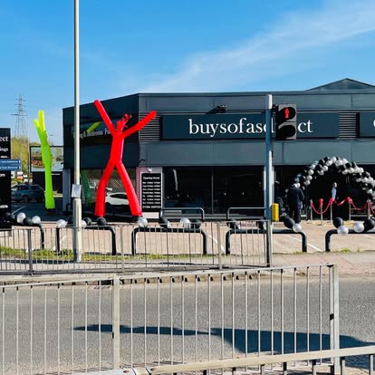 Open day venue with inflatable air dancers and entrance styling