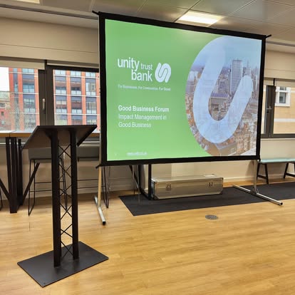 Portable projector screen for a business event