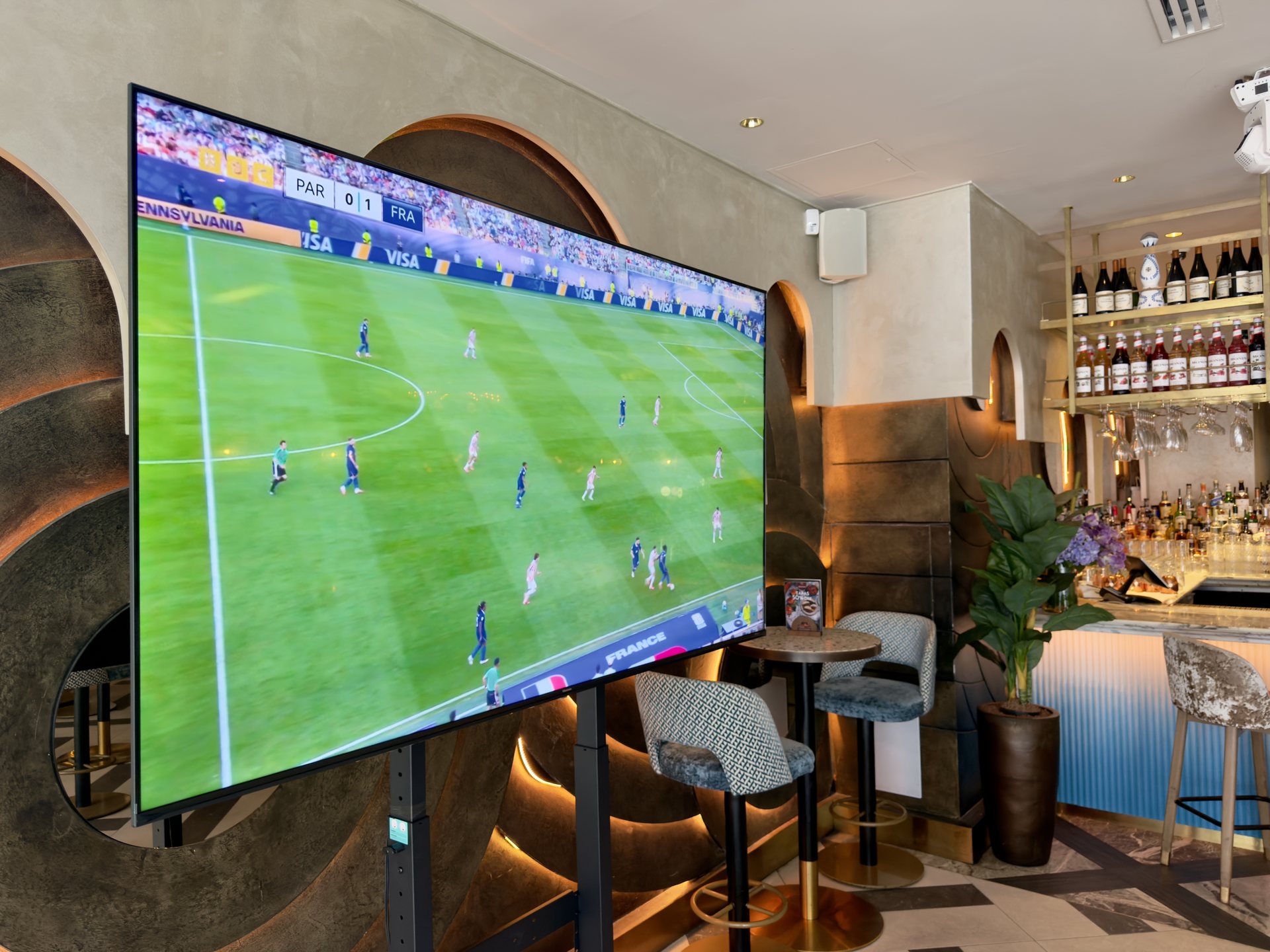 Large TV display screen in a hospitality venue