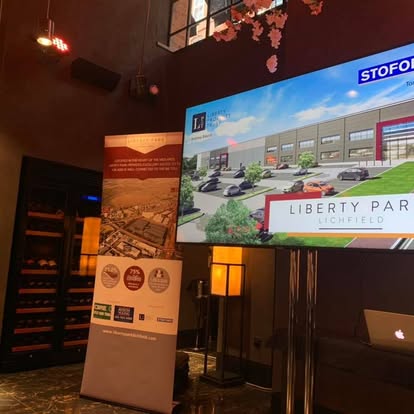 Large LED presentation screen at an event