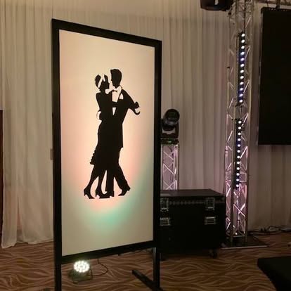 Illuminated silhouette prop panel