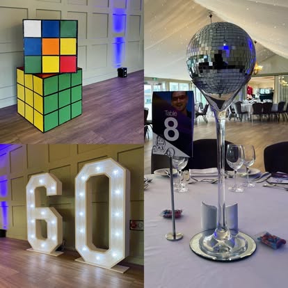 Themed prop collection including mirror ball and numbers