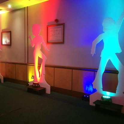 Backlit silhouette props with coloured uplighting