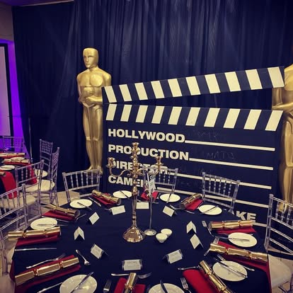 Hollywood clapboard and Oscar props
