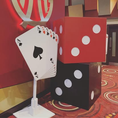 Casino prop display with giant dice and cards