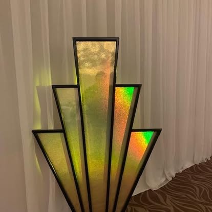 Art deco prop panel lit for an event