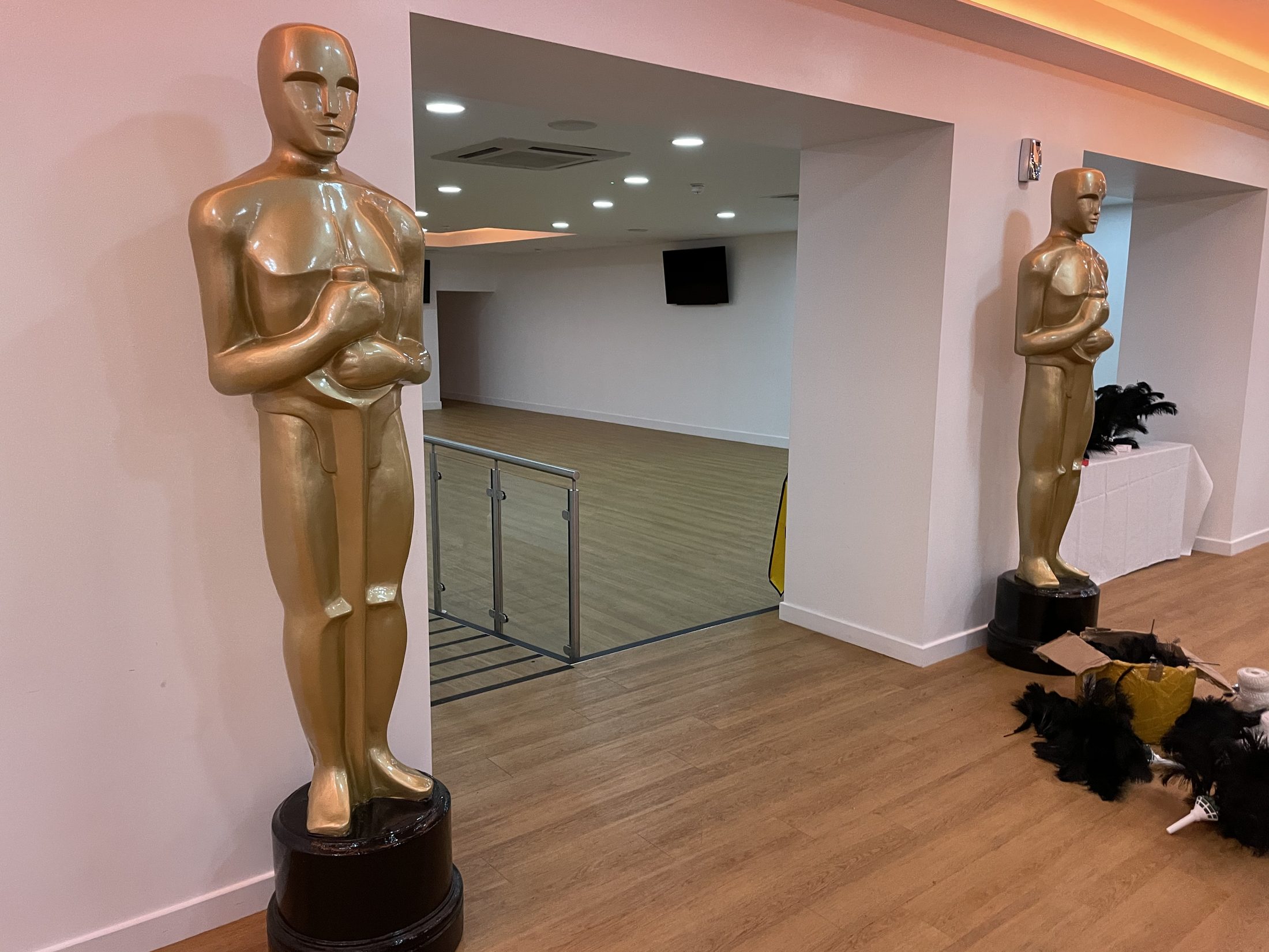 Gold awards statues used as event props