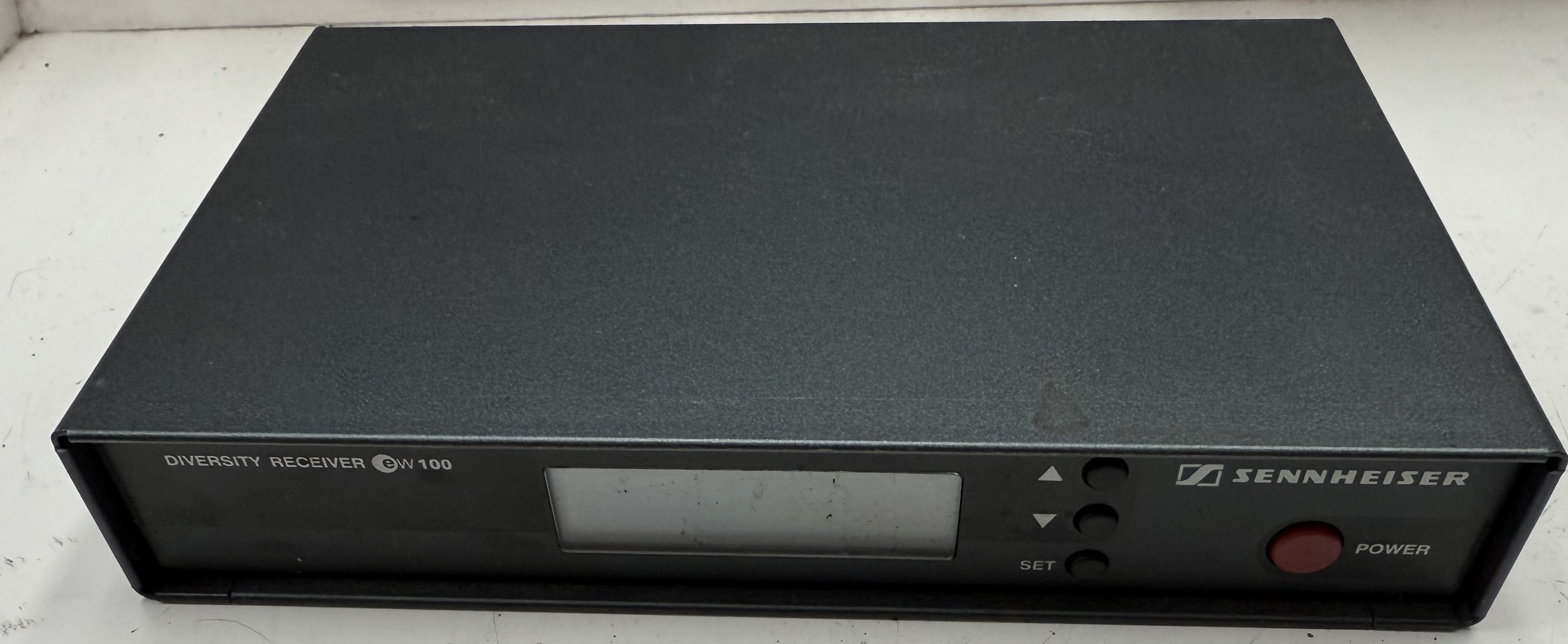 Front view of a used Sennheiser EM 100 true-diversity wireless microphone receiver
