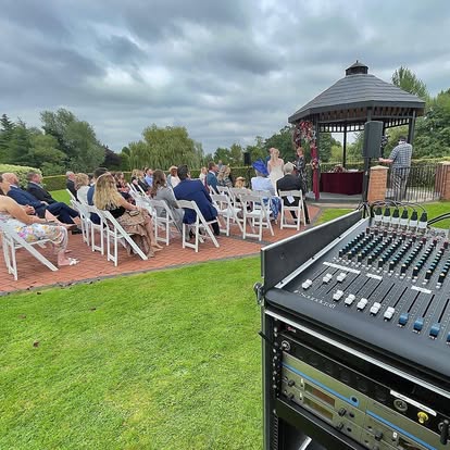Outdoor ceremony sound desk and speakers
