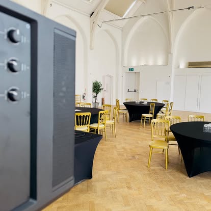 Speaker setup in a white hall