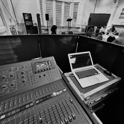 Live sound control position with laptop and mixer