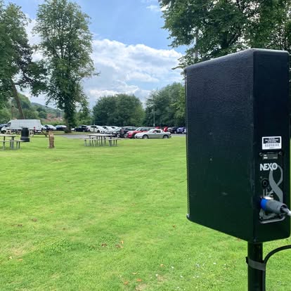 Outdoor speaker system in a field