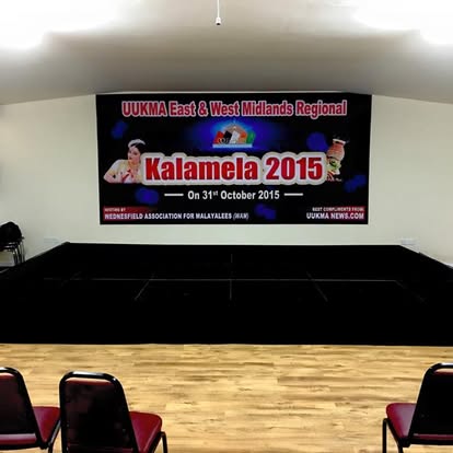 Wide event stage with large banner backdrop