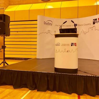 Stage with lectern and backdrop