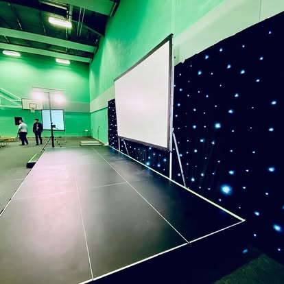 Stage with screen in a sports hall
