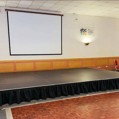 Conference stage with projection screen