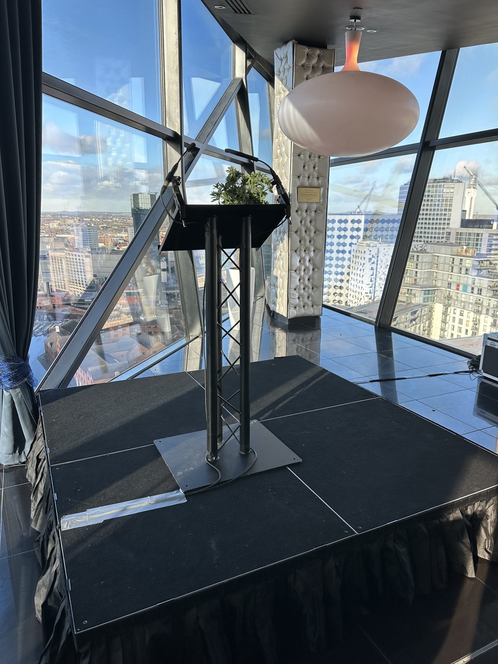 Lectern on a small stage for a Birmingham presentation event
