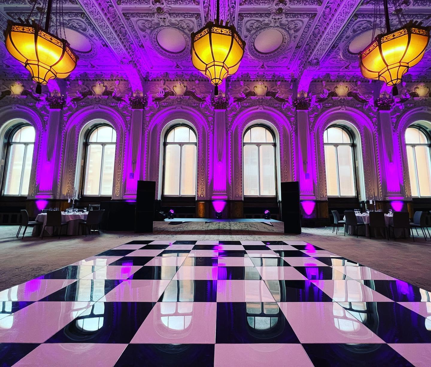 Warm uplighting in an event venue