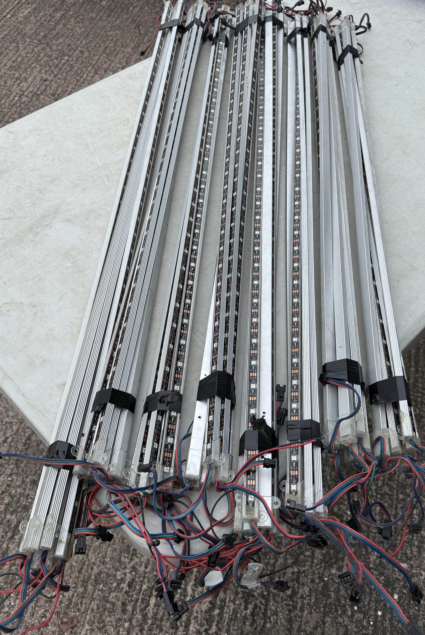 Used addressable RGB LED strip bar sections removed from an installation