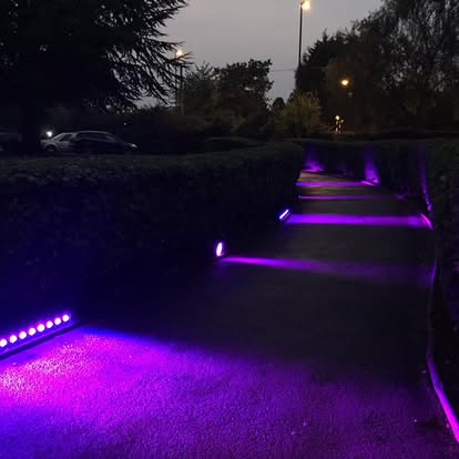 Outdoor pathway wall wash lighting