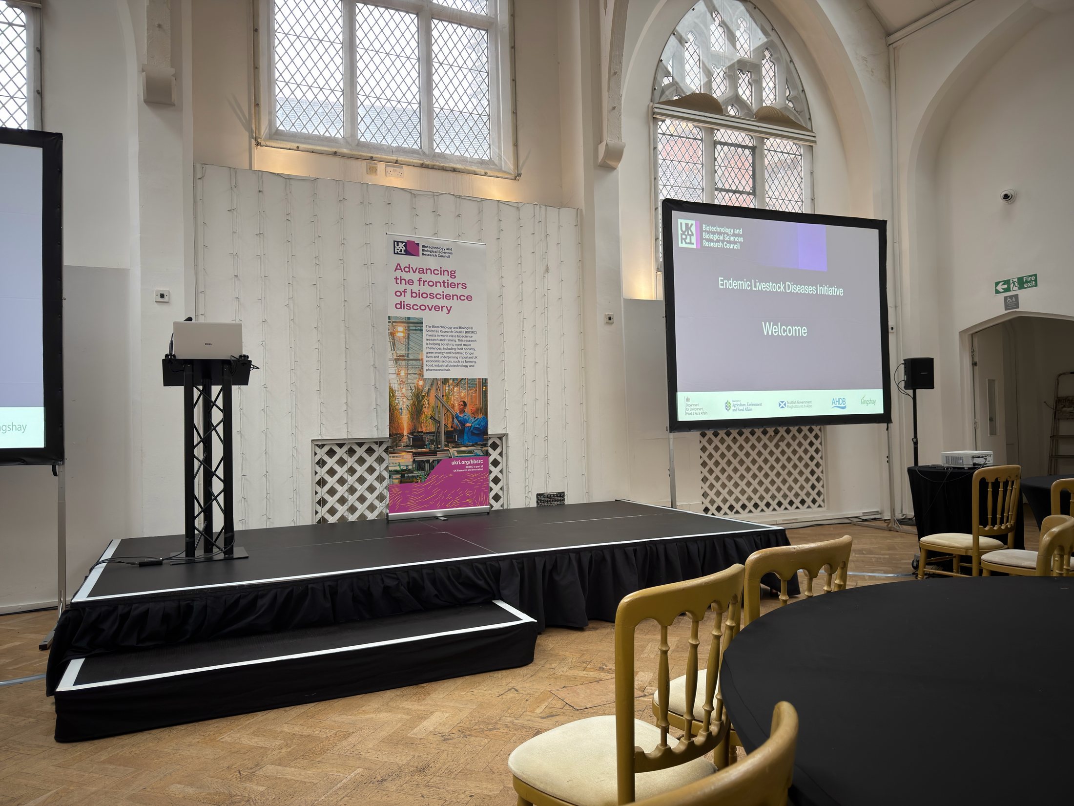 Equipment-only meeting setup with stage, screen, lectern and projector at The Old Library Birmingham